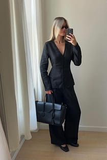 Timglasformad blus i linne
