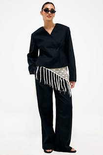 Wijde broek van linnenmix met omslagdetail