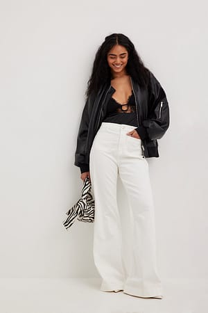 70’ernes jeans med lomme på forsiden og vide ben