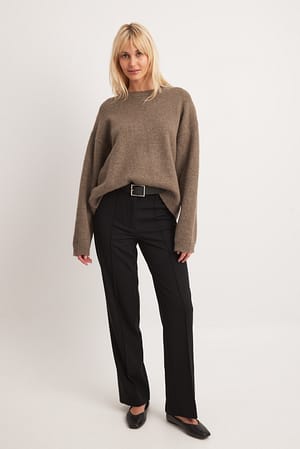 Pantalon met split aan de achterkant