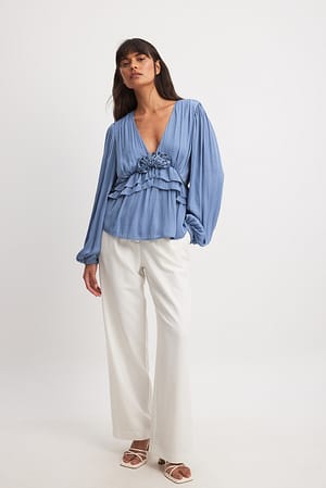 Blouse met ruches en ballonmouwen