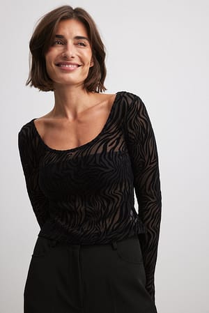 Haut en tulle effet dévoré à encolure ronde