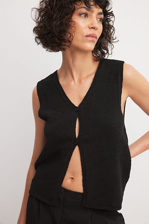 Gebreide blazertop met knoopdetail