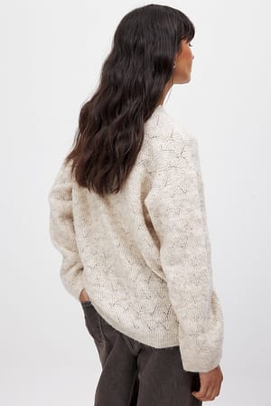 Pull oversize en maille torsadée