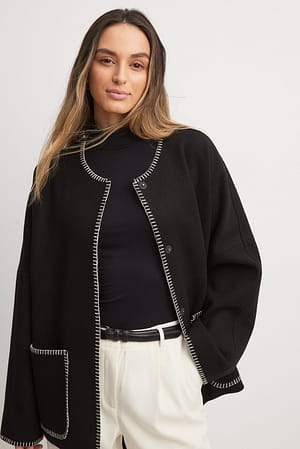 Veste à surpiqûres contrastantes