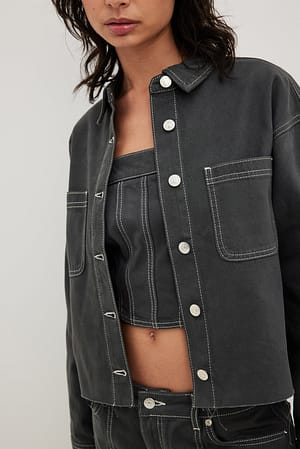 Denim korset met contrasterend stiksel