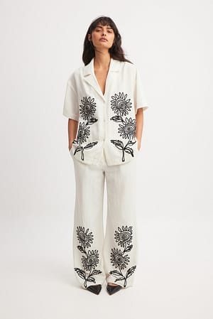 Pantalon taille mi-haute ornementé