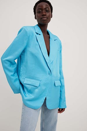 Blazer med lommer foran