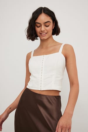 Corset avec fermeture par agrafes sur le devant