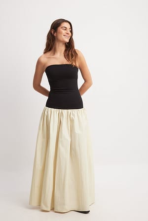 Ermeløs maxikjole i jersey og poplin