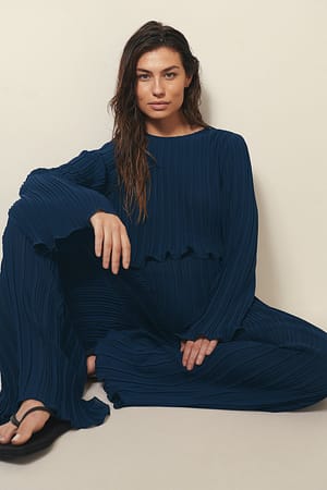 Blusa reciclada y holgada de manga larga