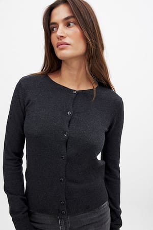 Gebreid vest met knopen