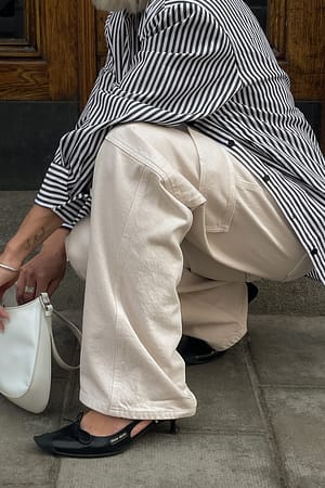 Jean taille basse avec poches