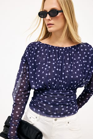 Blue Topp i mesh med markerad midja