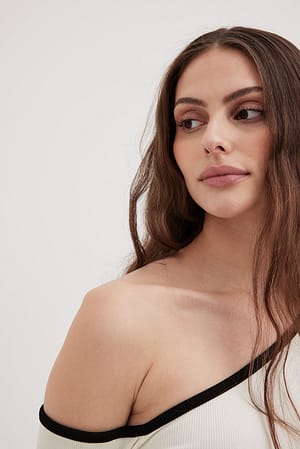 Asymmetric Contrast Binding Top