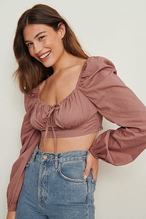 Genanvendt bluse i bomuld med lange ærmer og rynker