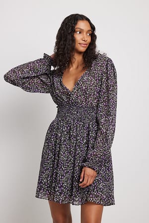 Struktureret kjole med rynket talje