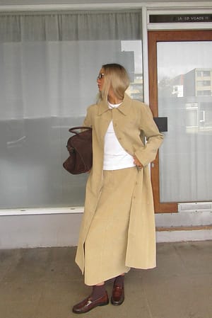 Skjørt i imitert semsket skinn