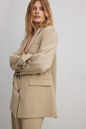 Figursyet blazer i overstørrelse
