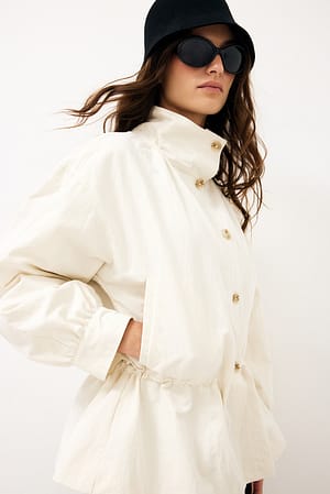 Offwhite Peplum trenchcoat