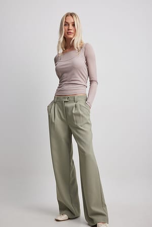 Pantalon de tailleur à taille mi-haute avec poches