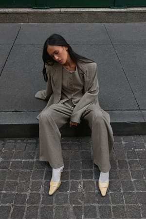 Pantalon ample taille mi-haute avec poches