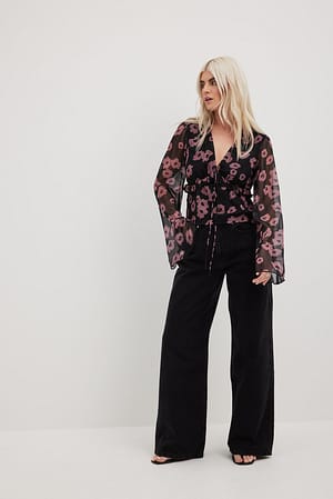 Blouse volantée en mousseline à manches longues et imprimé