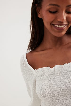 Dobby-Bluse mit Puffärmeln