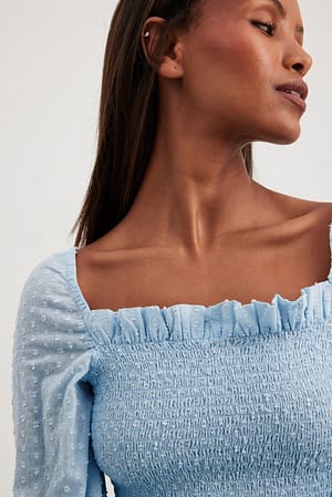 Blouse en dobby à manches bouffantes