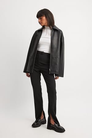 Recycled byxor med sidoslits