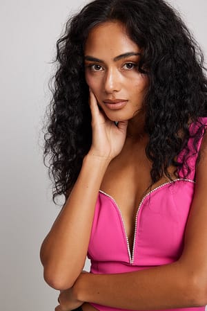 Topp med strassdetaljer