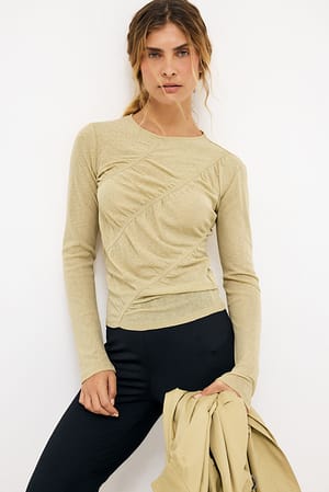 Cream Top de jersey de manga larga con volantes