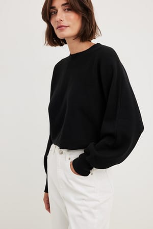 Jersey de punto corto de cuello redondo