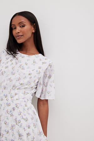 Robe mini volantée en mousseline