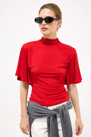 Red Haut en jersey avec volants et épaulettes