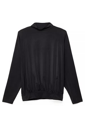Black Skulderputevolum topp