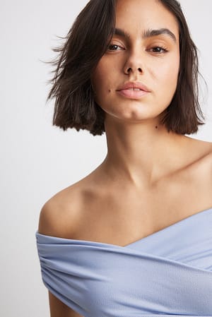 Top uden skuldre og uden ærmer