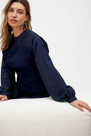 Strukturert bluse med ballongermer