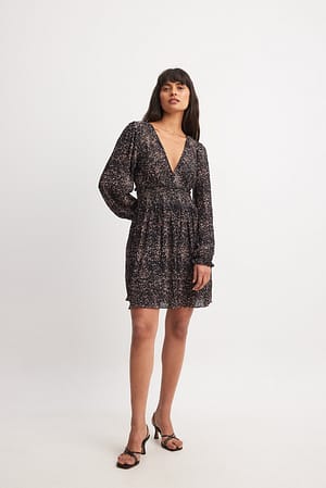 Struktureret kjole med rynket talje