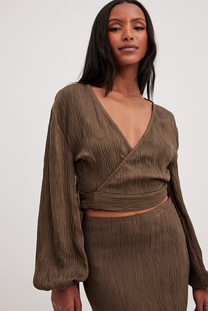 Blouse cache-cœur nouée sur le devant à col en V