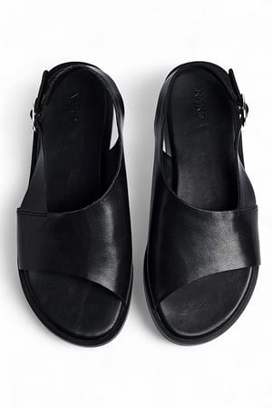 Black Flate-sko i skinn med slingback og brede stropper
