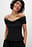 Top met off-shoulder en strikdetail