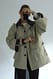 Beige Jacke mit Kordelzug und Kontraskragen