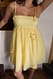 Yellow Minikleid aus Organza mit Blumendetail