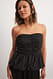 Black Pinstripe Peplum-Oberteil in Anzugqualität
