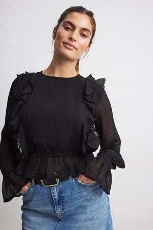 Black Dobby-bluse af genanvendt materiale med flæser