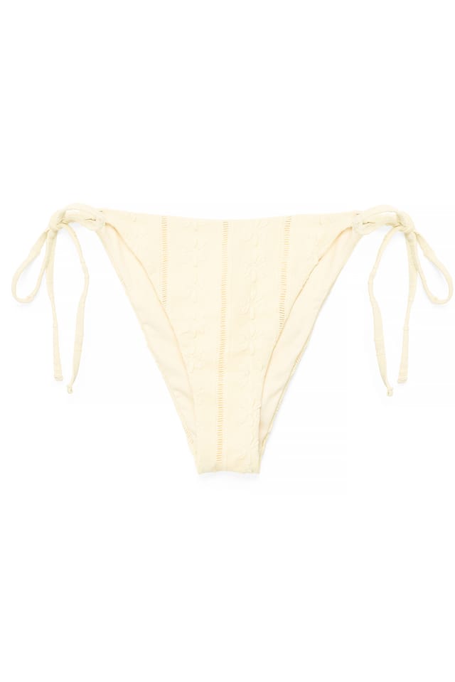 Light Yellow Anglaise-bikinitrosa med knytdetalj