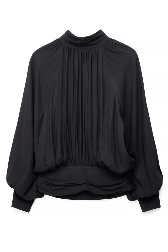 Black Blus med ballongärmar och öppen rygg