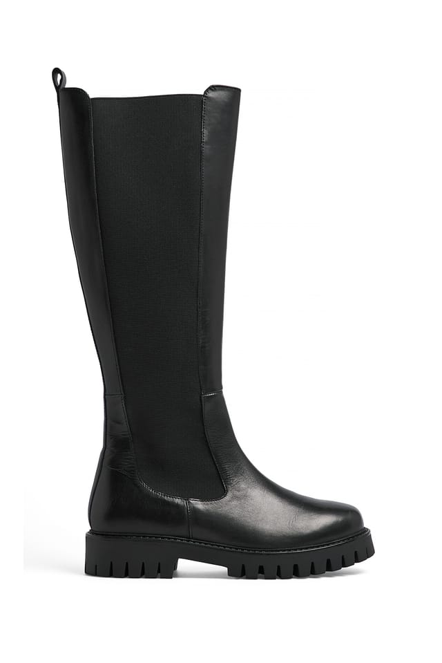 Black Knähöga elastiska boots i läder