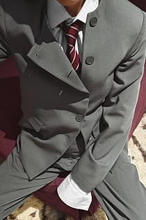 Americana de botones y cuello alto